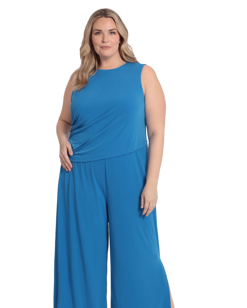 Front of a model wearing a size 16W Jewel neck side ruched jumpsuit in Dirblue by London Times. | dia_product_style_image_id:268548